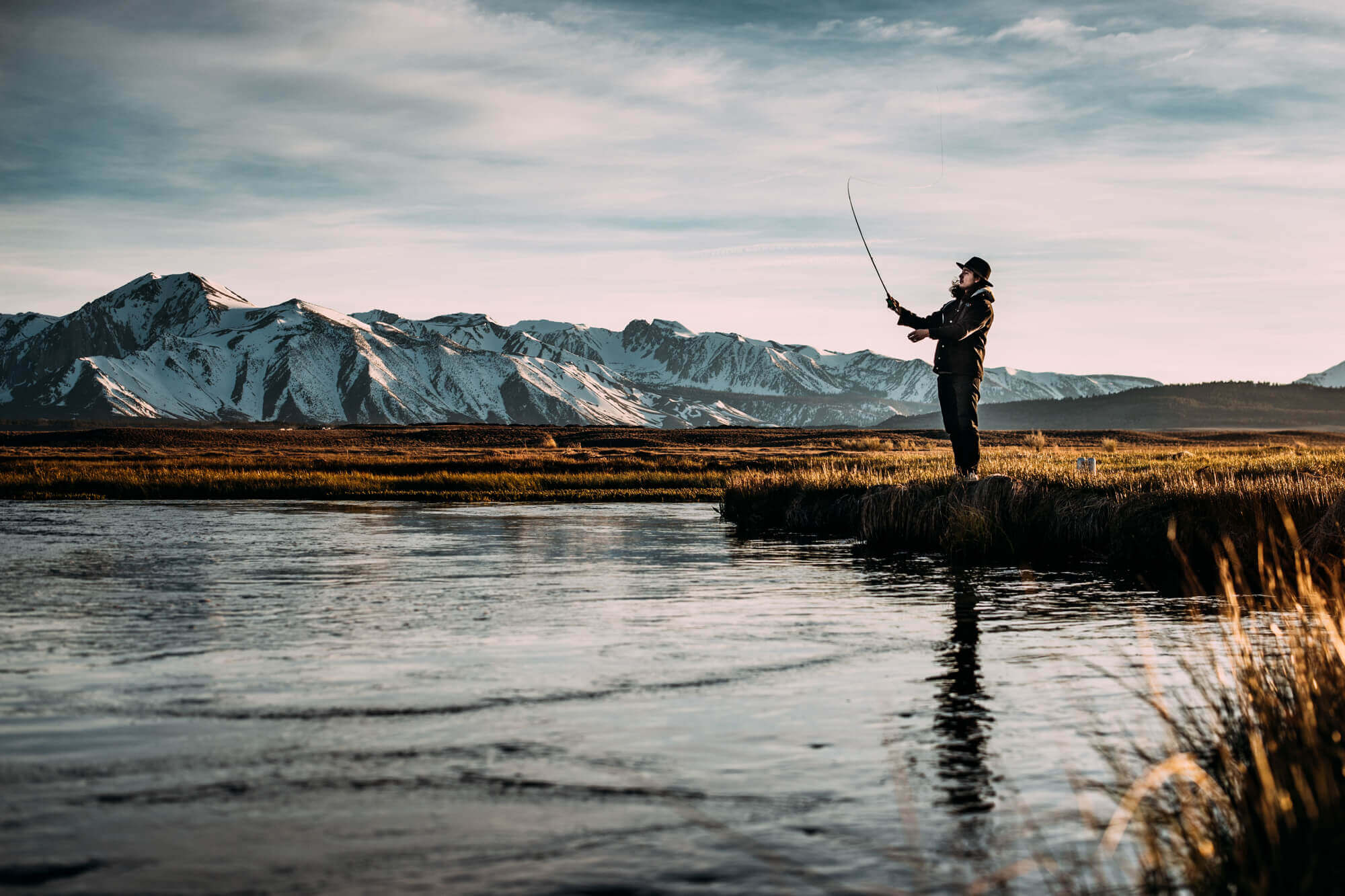 A man fishing in a lake